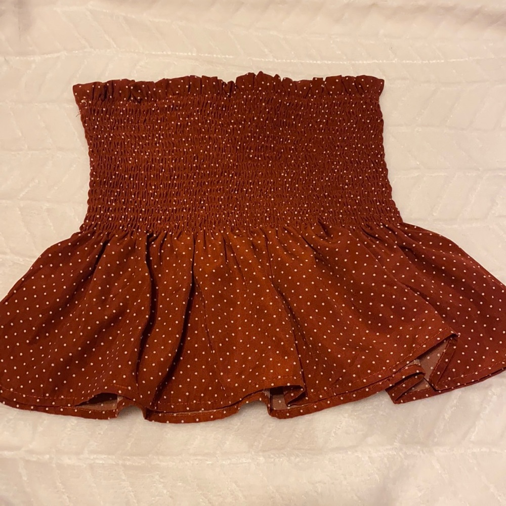 Polka dot strapless peplum top